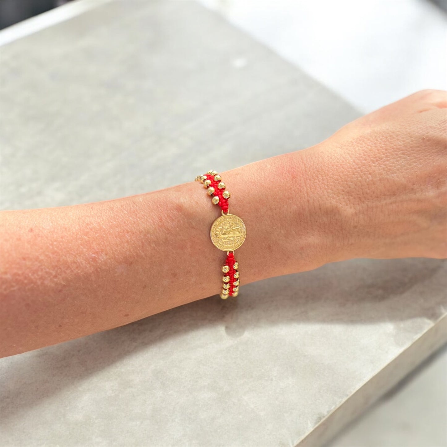 San Benito red thread bracelet with golden spheres